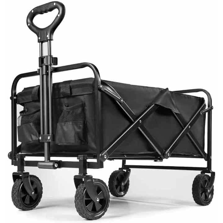 A black folding utility wagon with a tubular metal frame, four wheels, a D-shaped handle, and a large fabric cargo bed with side pockets, shown on a white background.